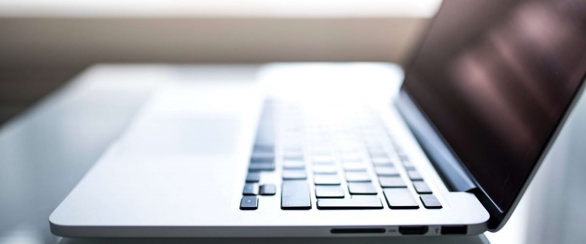 Shallow focus photography of macbook